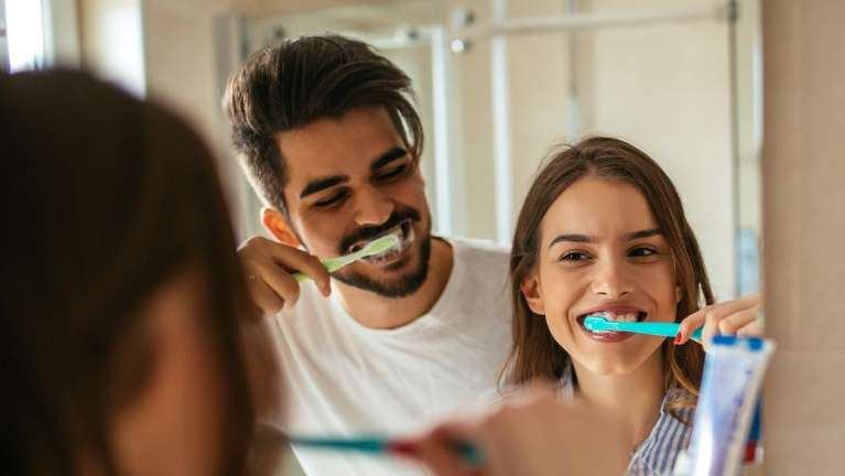 couple brushing their teeth in boulder co