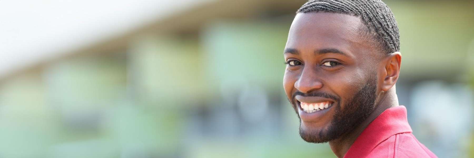 A man smiling after getting Dental Implant in Boulder, CO